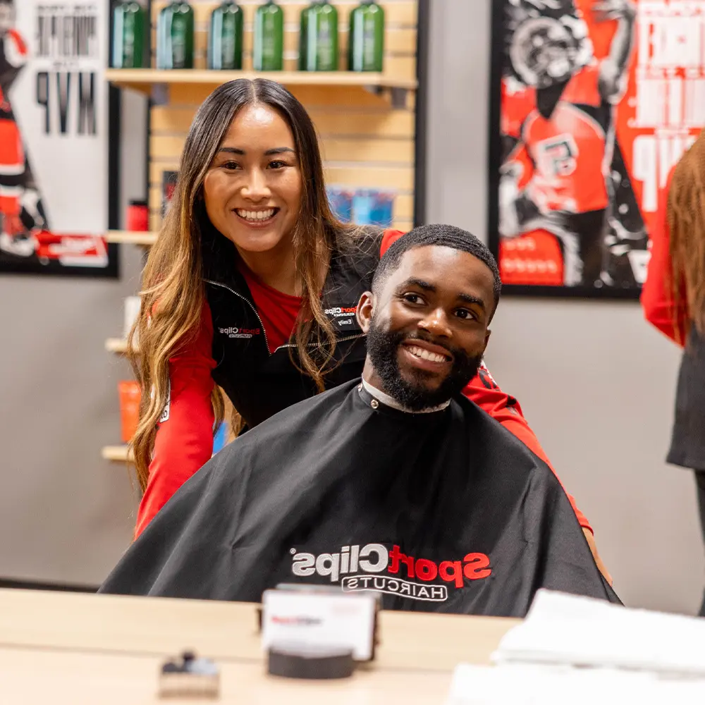varsity-haircut man happy with his haircut
