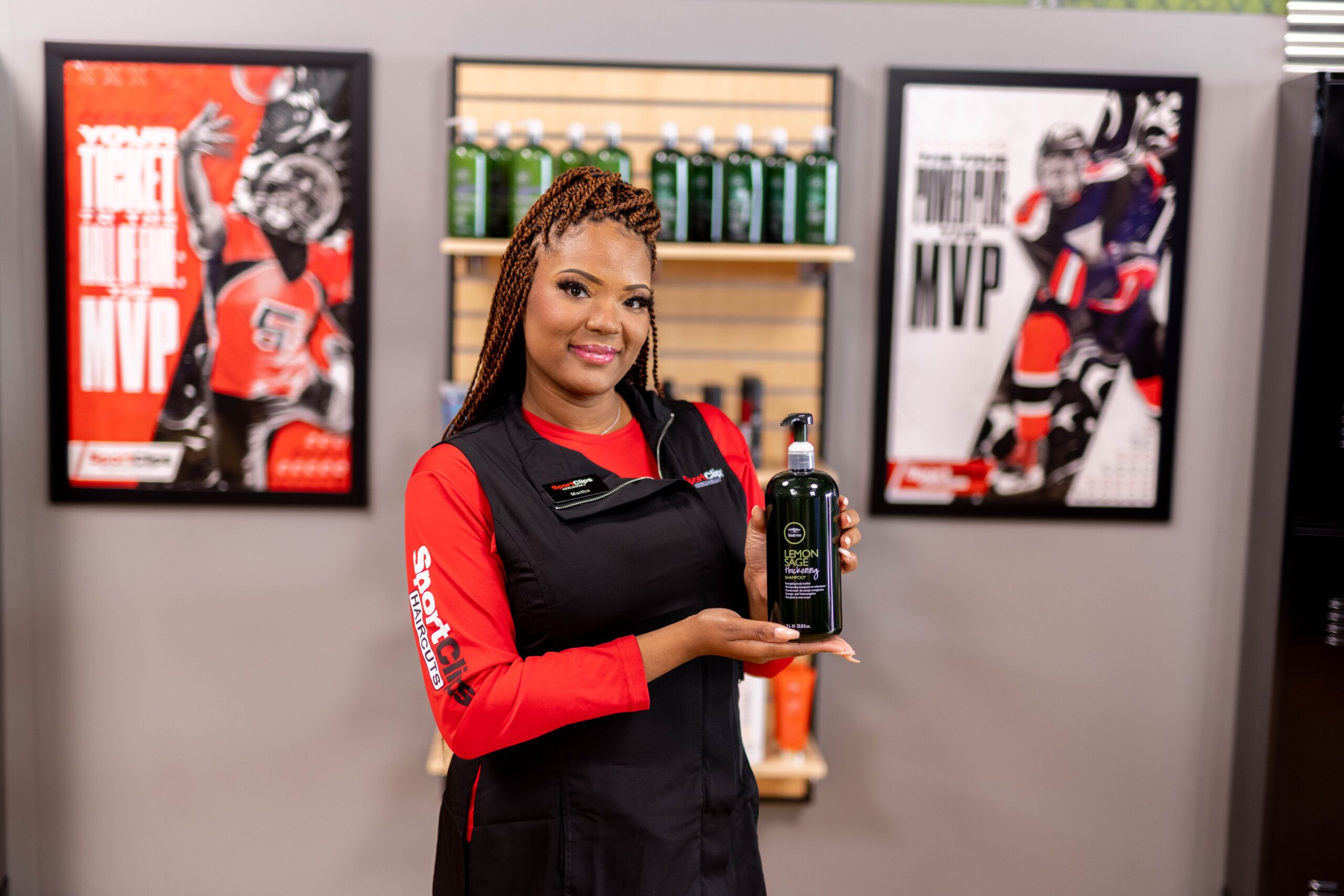 Ellipse 52 woman holding hair care product