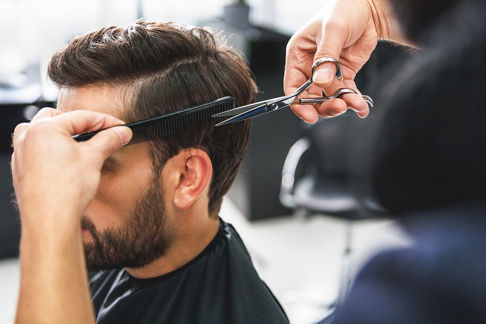 cutting hair with scissors